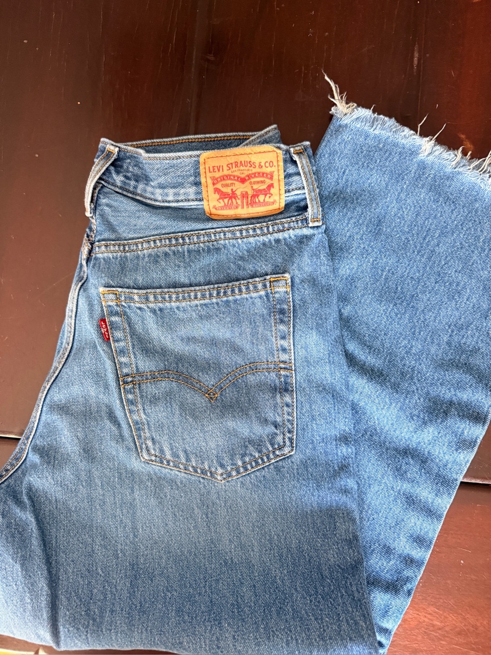 Levi's Classic Light Blue Straight Jeans with Raw Hem